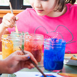 Close up of a girl painting with the Natural Earth eco-friendly painting kit