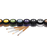 Natural Earth kids eco-friendly face paint jars lined up on a white background with some wooden paint brushes