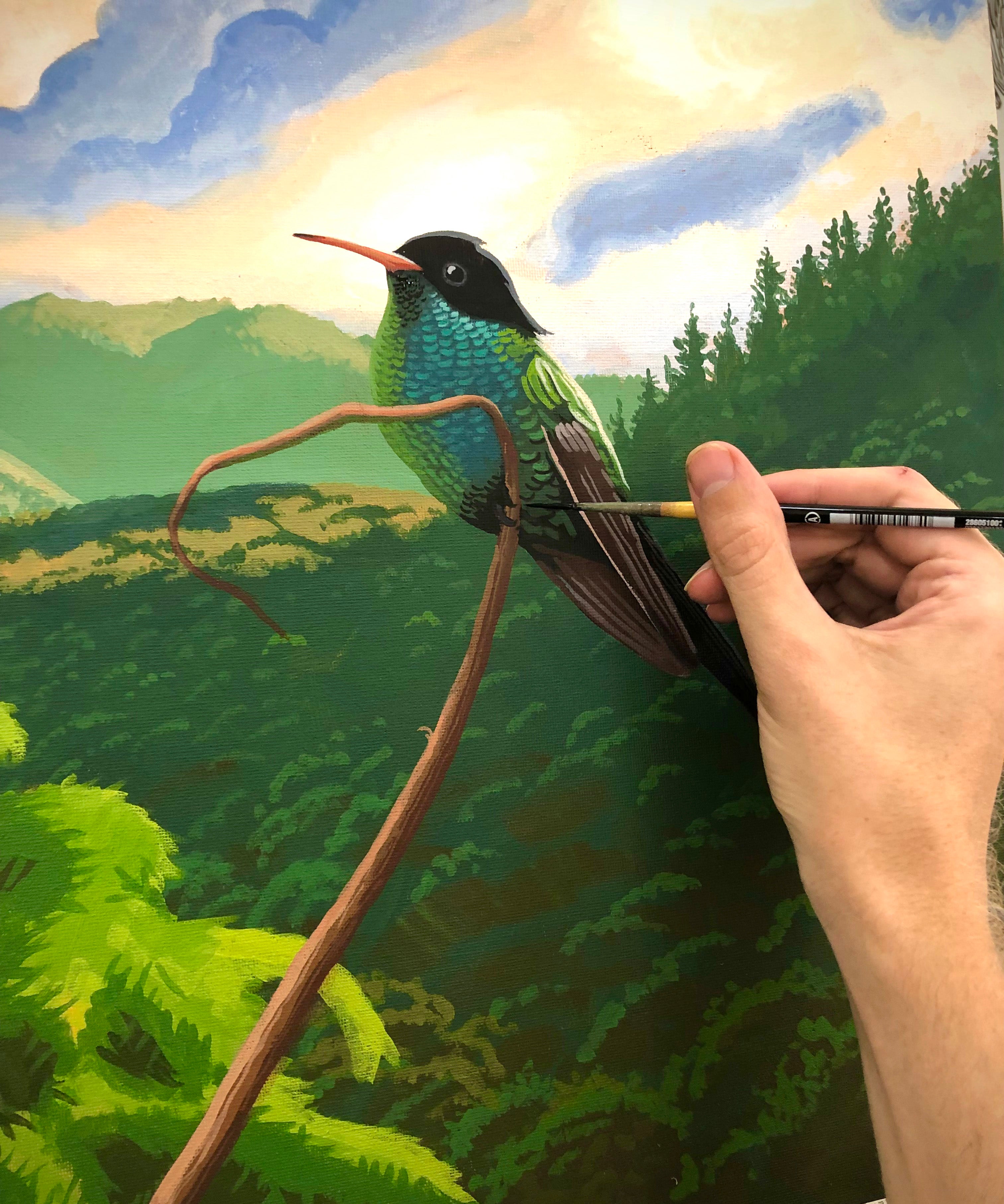An artist painting a landscape photo with bird perched on a twig using the Natural Earth Paint natural acrylic paints