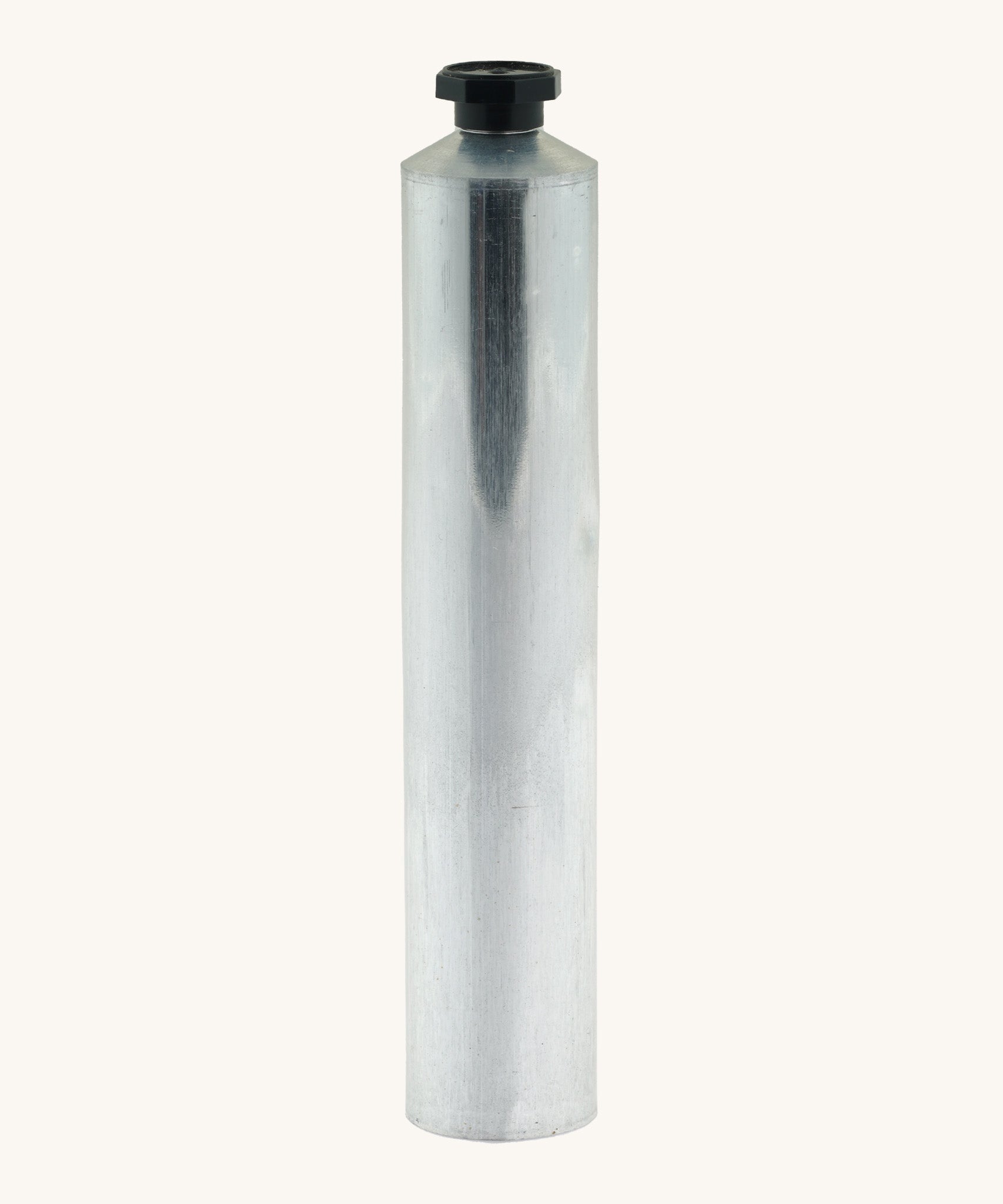 A blank flexible aluminium tube from Natural Earth Paint standing upright. Features a black screw cap to keep the contents inside the tube