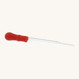 Natural Earth Paint glass dropper. A glass tube with a red squeeze handle for adding binders to pigments