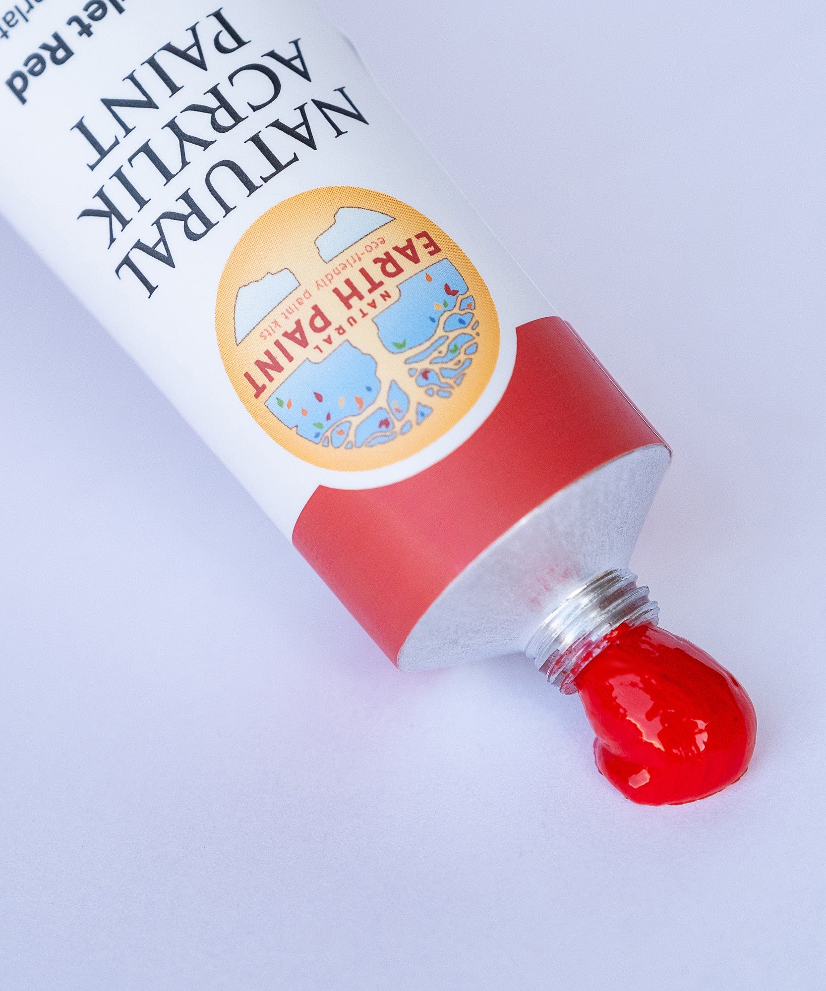 A close up of the scarlet red paint from Natural earth paint aluminium tube showing the consistency