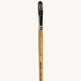 A close up view of the size 12 Natural Earth paint brush showing the wooden handle and brand name printed on the side