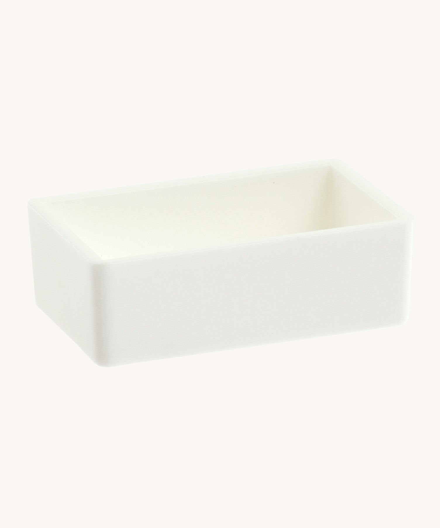 Side view of the blank white watercolour paint pan from Natural Earth Paint showing the depth of the blank pan