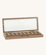Natural Earth Paint wooden palette with a brush holder made for holding and mixing watercolour paints is a flip style palette and features 18 sections for paint and a section to hold pain brushes with a large blank mixing panel.