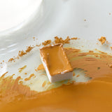 Natural Earth Paint watercolour pan filled with mustard yellow paint