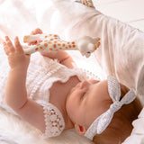 A child laid in a baby basket