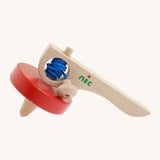 Nic Toys wooden red spinning top. Features a wooden handle for handling the spinner top with a blue cord for spinning the top.