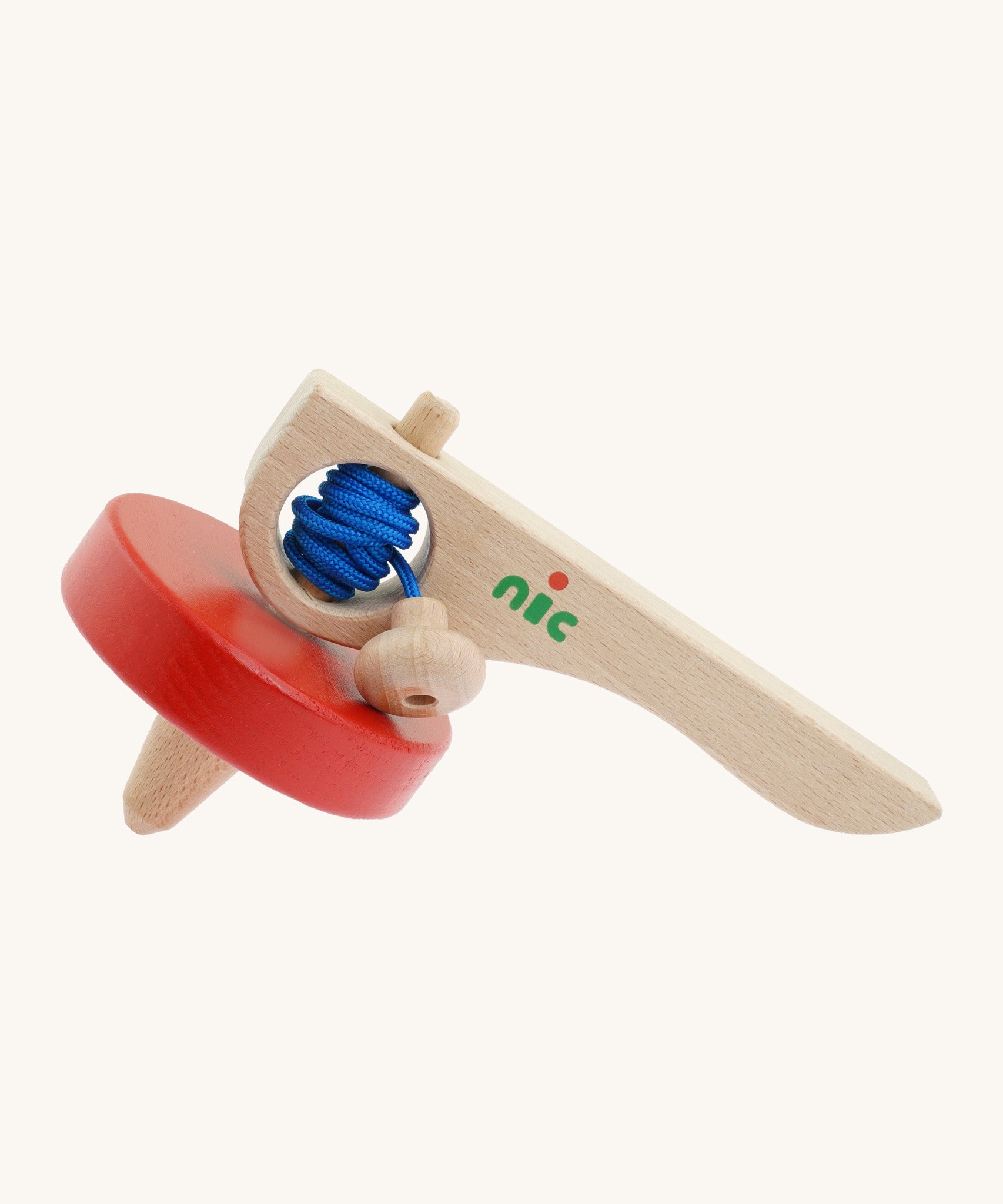 Nic Toys wooden red spinning top. Features a wooden handle for handling the spinner top with a blue cord for spinning the top.