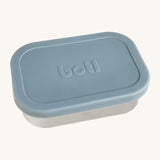 A One Green Bottle lunchbox in soldier colour. A stainless steel plastic free lunchbox available at Bapipur. Features a pale blue silicone lid.