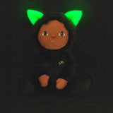 Olli Ella Carson Cat Dinky Dinkum Doll. This soft toy is a black cat with glow in the dark inner ears and a small embroidered rainbow detail on the chest. These soft toys are part of Olli Ella's Halloween collection available here at Babipur.
