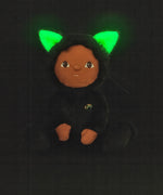 Olli Ella Carson Cat Dinky Dinkum Doll. This soft toy is a black cat with glow in the dark inner ears and a small embroidered rainbow detail on the chest. These soft toys are part of Olli Ella's Halloween collection available here at Babipur.