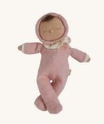 The Olli Ella Dozy Dinkum Doll - Toadstool Pip. It has a pink onesie with a and a ruffled collar.