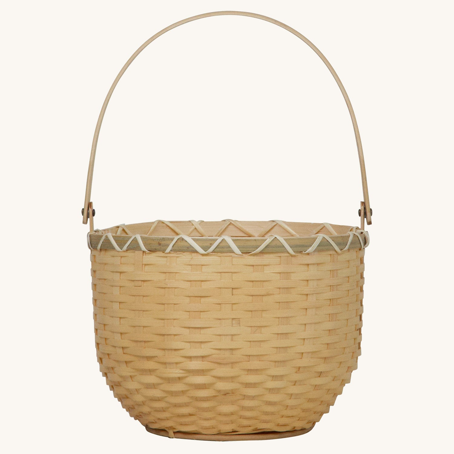 Olli Ella Nude Big Blossom Basket pictured on a plain beige background