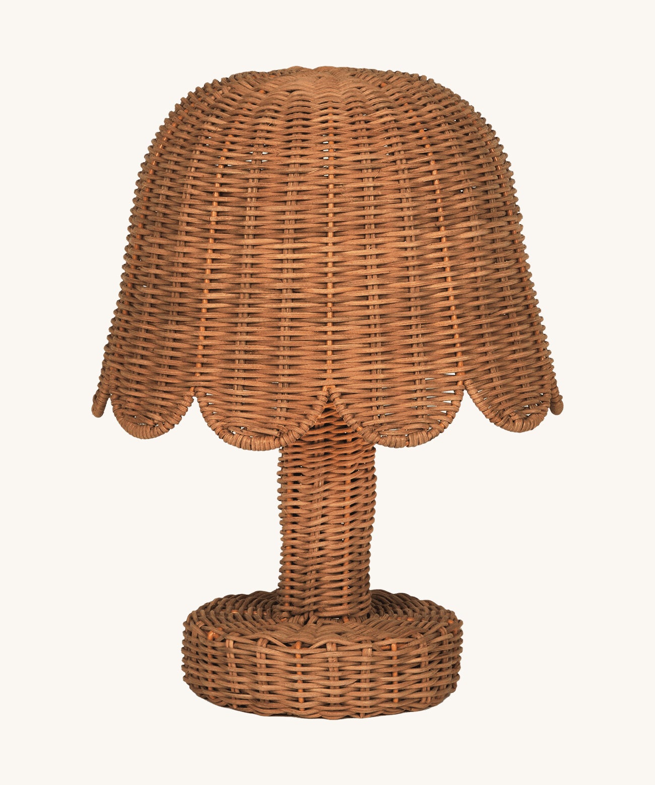 An Olli Ella Rattan Petal Lamp in the Natural colourway.