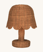 An Olli Ella Rattan Petal Lamp in the Natural colourway.
