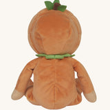 The back of an Olli Ella Jack-O-Lantern pumpkin dinky dinkum doll. The soft doll has a glow in the dark face on it's belly and a small embroidered rainbow detail on it's chest. These soft toys are part of Olli Ella's Halloween collection available here at Babipur.
