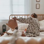The Olli Ella Rattan Lily Basket Set in Seashell Pink view from above