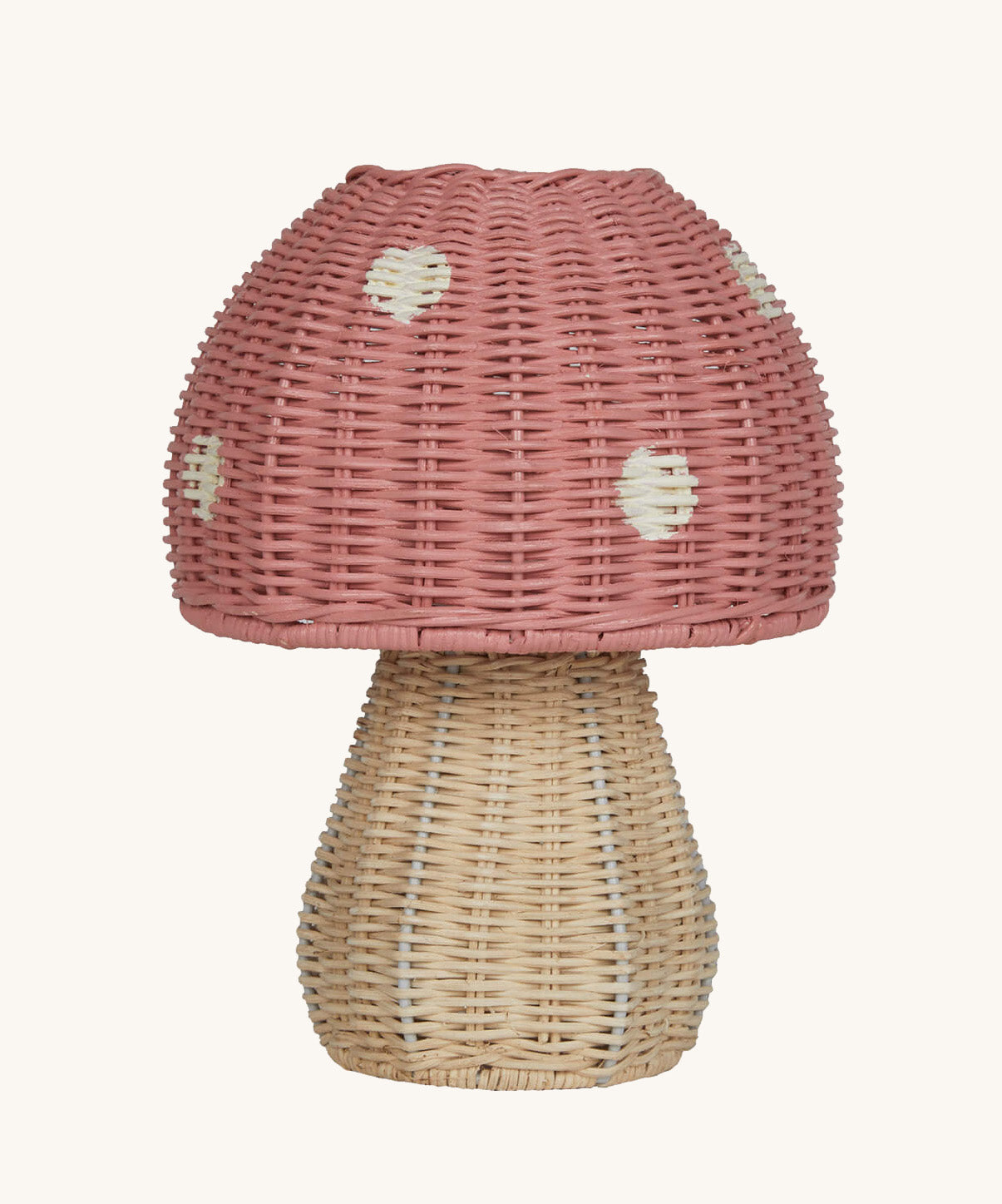 The Olli Ella rattan toadstool lamp with a natural base and a pink mushroom top