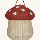 The Olli Ella large woven rattan storage basket, in the shape of a mushroom with a spotty red toadstool lid.