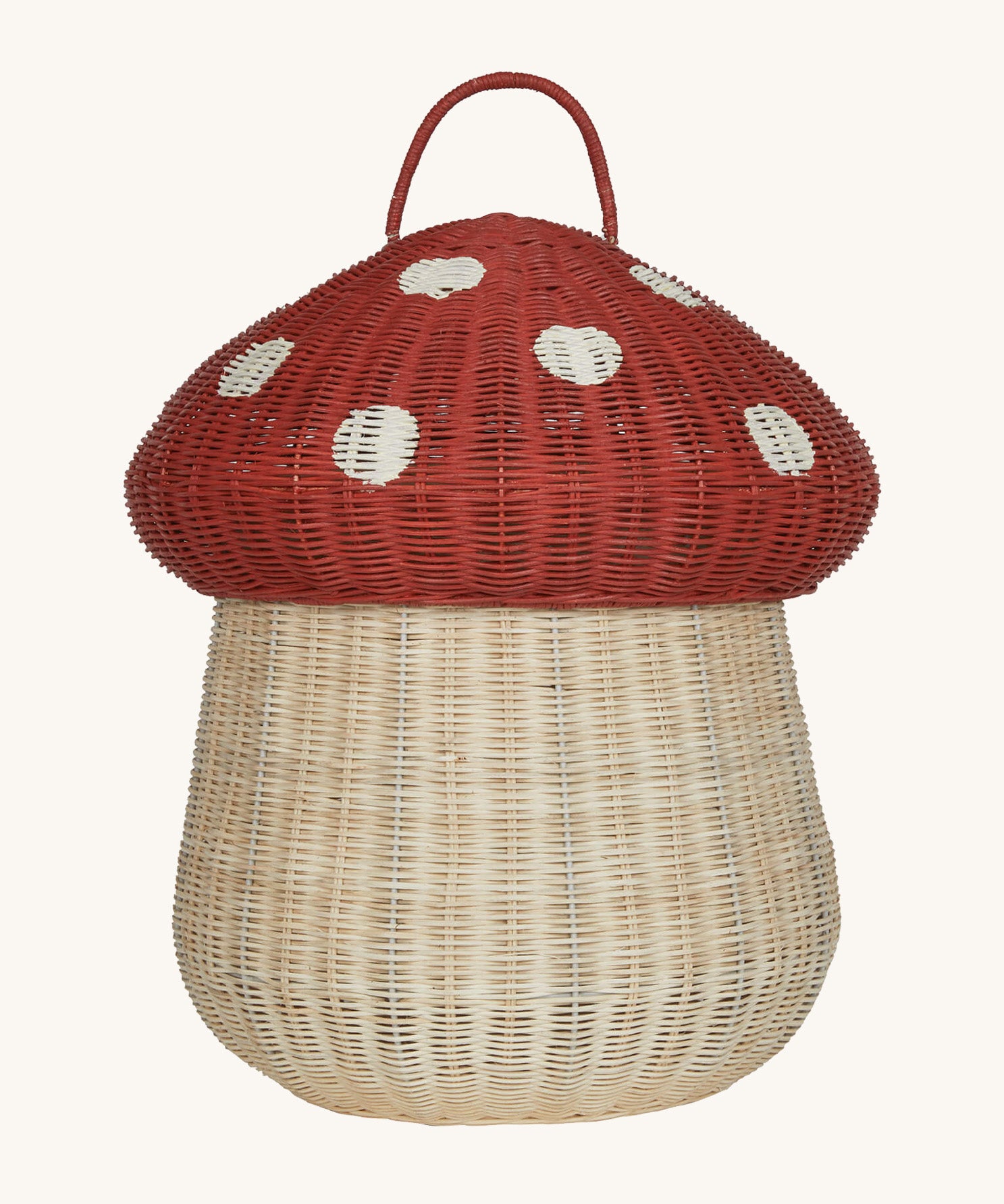 The Olli Ella large woven rattan storage basket, in the shape of a mushroom with a spotty red toadstool lid.