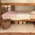 on a rug in a bedroom