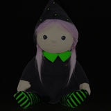 Olli Ella Willa Witch Dinky Dinkum Doll. A witch with a black outfit and matching hat with glow in the dark features on the striped tights, collar and stars on the hat. These soft toys are part of Olli Ella's Halloween collection available here at Babipur.
