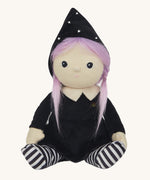 Olli Ella Willa Witch Dinky Dinkum Doll. A witch with a black outfit and matching hat with glow in the dark features on the striped tights, collar and stars on the hat. These soft toys are part of Olli Ella's Halloween collection available here at Babipur.