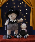 An Olli Ella endy witch dinkum doll standin next to an Olli Ella Willa Witch Dinky Dinkum Doll. These soft toys are part of Olli Ella's Halloween collection available here at Babipur.