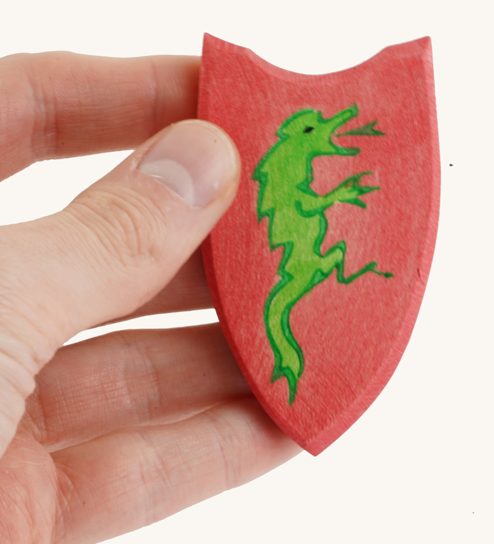 Ostheimer Black Knight Shield  being held in an adult's hand.