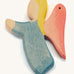 A blue wooden angel figure on a cream background.
