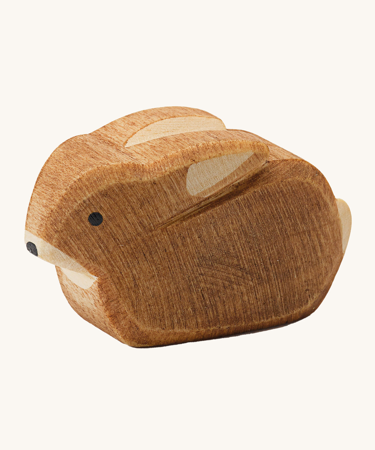 Ostheimer small rabbit wooden oy figure on a plain background.