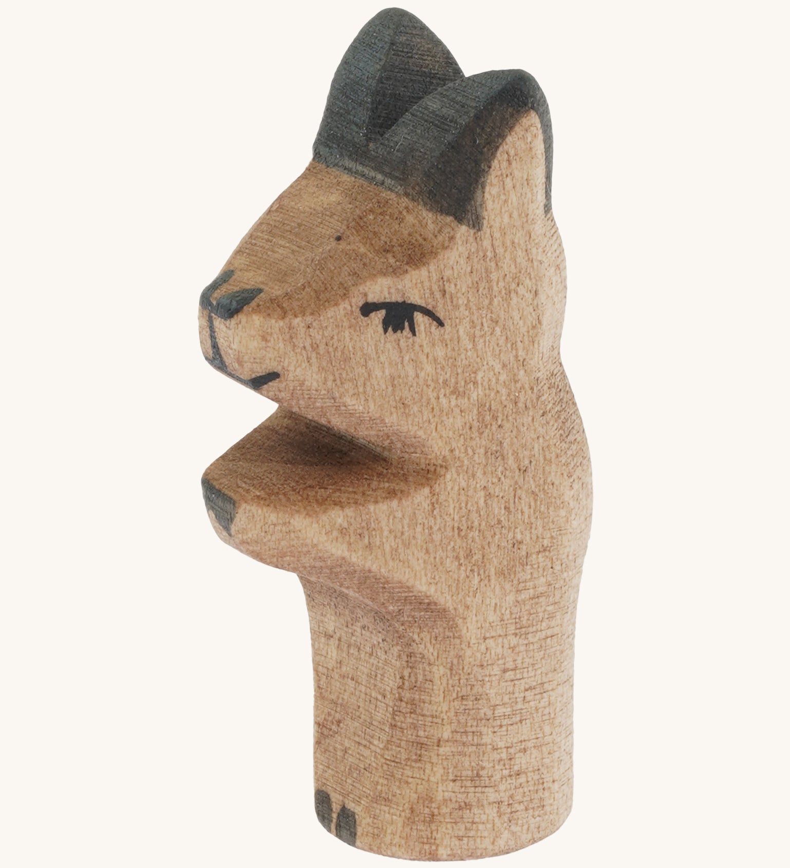 A close up of the Ostheimer wooden baby kangaroo figure showing it's head and body detail