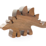 O-WOW handmade walnut stegosaurus toy on a white background