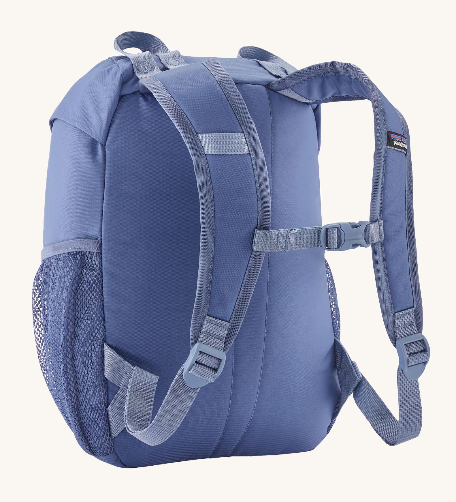 A reverse image of the The Patagonia Kids Refugito 12L Backpack  in current blue showing the padded shoulder straps and matching chest straw detail