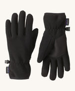 Patagonia kids synchilla gloves. A pair of solid black light fleece fabric gloves, features a grip panel on the palm, thumb and index finger.   Logo patch stitched on the wrist cuff.