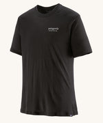 The Patagonia Men's Capilene Cool Merino Graphic Shirt with a Heritage Header design in Black on a plain background.