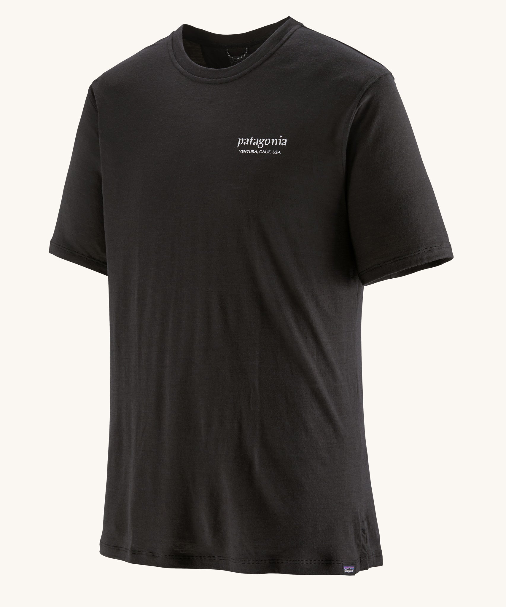 The Patagonia Men's Capilene Cool Merino Graphic Shirt with a Heritage Header design in Black on a plain background.