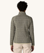 A woman wearing the Patagonia Women's Better Sweater Jacket with a scales pattern We have a wide selection of Patagonia adults and children's clothing here at Babipur.