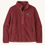 Patagonia women's marsupial retro pile fleece in sequoia red. A thick fleece in a rich red colour with light red trim. Features  2 side and chest pockets with a brand patch stitched on the chest and a half length zip.