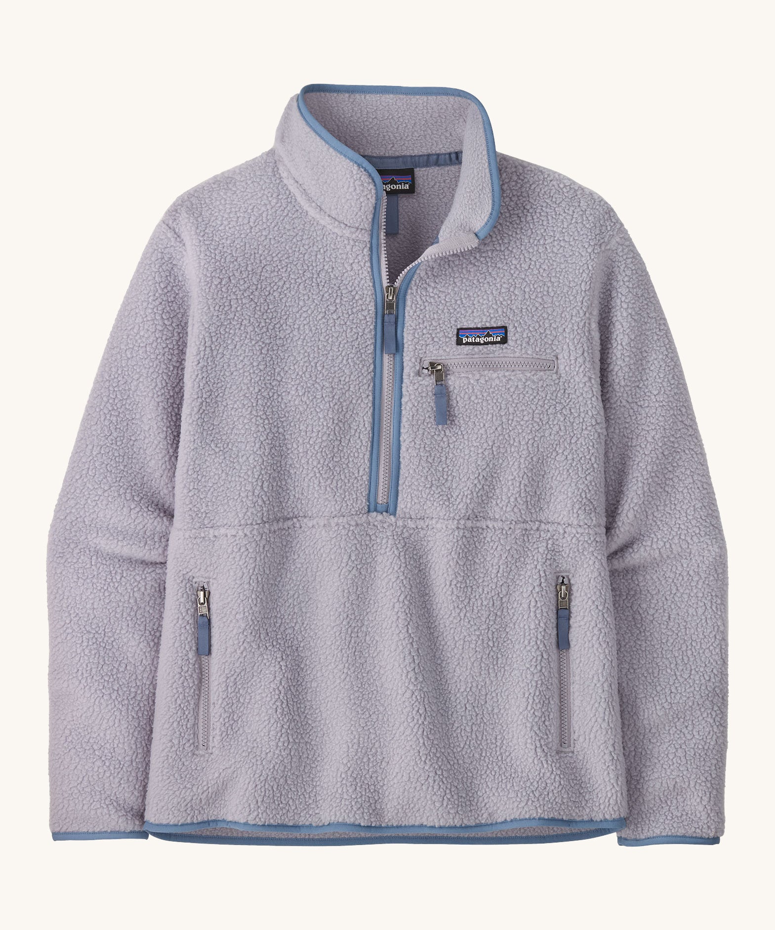 Patagonia women's retro pile marsupial fleece in light purple, long sleeves and a turn up collar. Features a half zip with side and chest pockets with the logo patch  on the front