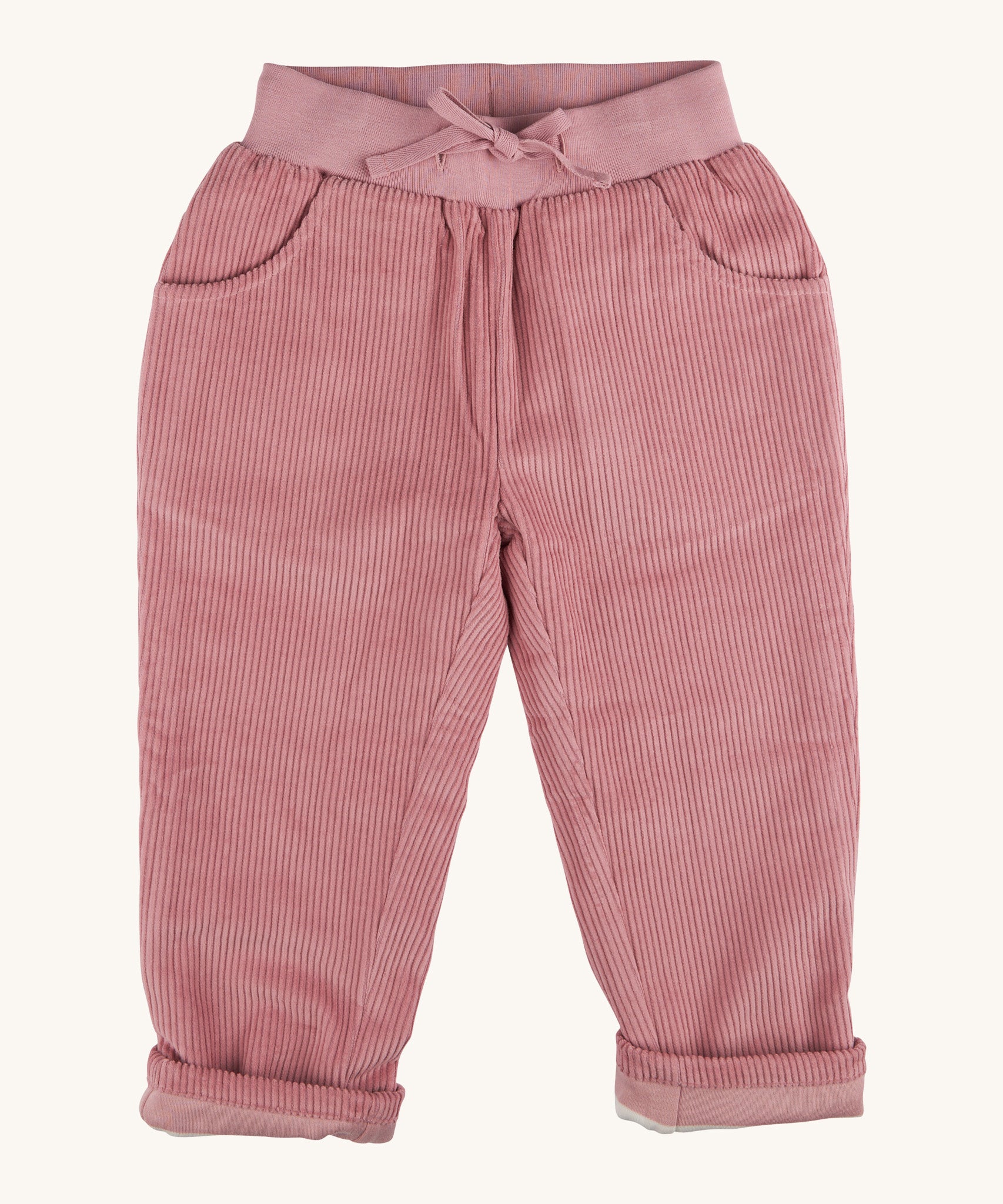 Pigeon Organics linen cord trousers - GOTS pink coloured organic cotton trousers in a corduroy style. Features 2 side pockets, a matching pink elastic waistband and drawstring detail at the front.