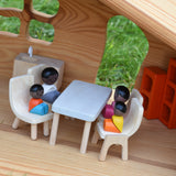 The Plan Toys black skin, black hair wooden doll family placed in an Ostheimer dolls house with wooden PlanToys dolls house furniture.
These wooden toys are part of a large range of wooden toys here at Babipur.