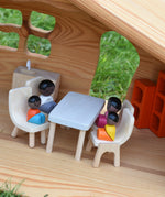 The Plan Toys black skin, black hair wooden doll family placed in an Ostheimer dolls house with wooden PlanToys dolls house furniture.
These wooden toys are part of a large range of wooden toys here at Babipur.