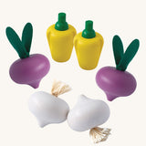 Plan Toys wooden play food Vegetable Produce Set containing Radish, Garlic & Yellow Peppers.