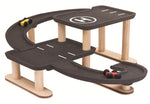 A side view of the PlanToys PlanWorld Race N Play Parking Garage on a plain background.