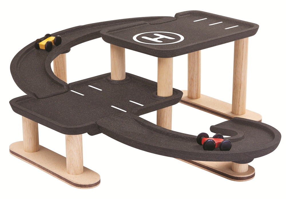 A side view of the PlanToys PlanWorld Race N Play Parking Garage on a plain background.