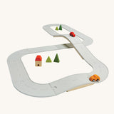 The Plan Toys large Rubber Road and Rail Set shown set up on a plain background.