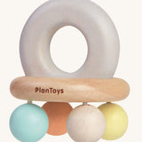 The PlanToys Pastel Bell Rattle on a plain background.