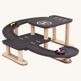 The PlanToys PlanWorld Race N Play Parking Garage on a plain background.